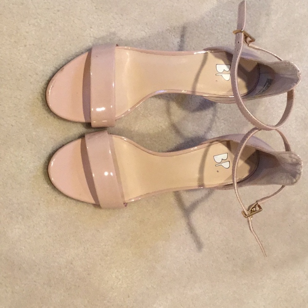Nude 2 inch high heels, a slight light pink tint